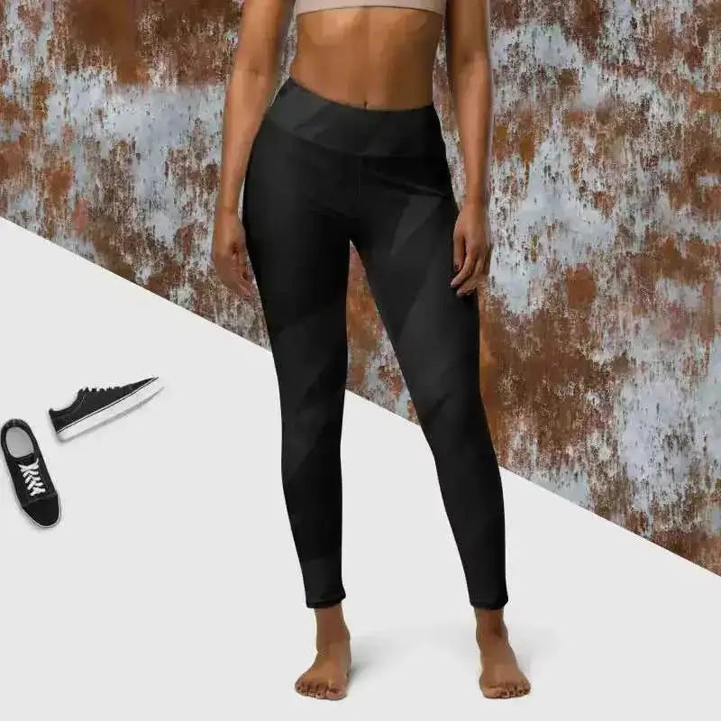 Black yoga leggings with a high waistband perfect for yoga and workout sessions