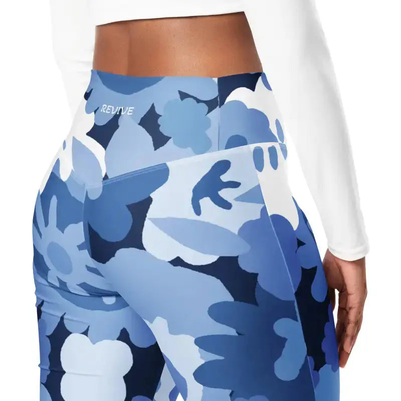 Blue floral flare leggings with butt-lifting cut and hands-free convenience for workouts