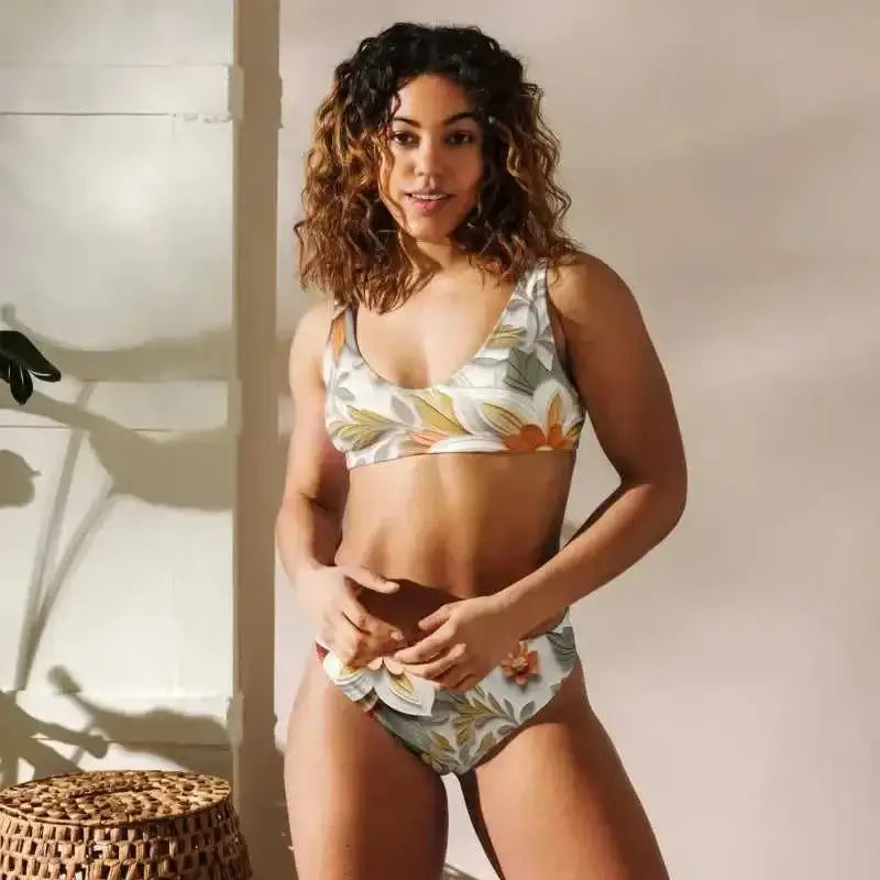 Elegant Recycled High-Waist Bikini - Revive Wear Comfortable and figure-flattering high-waist bikinis for women in stylish plus sizes. Made of soft, recycled material with removable padding. Shop Bikinis Today