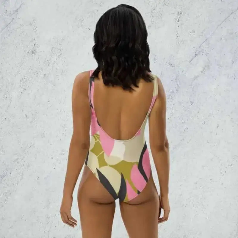 Vibrant Floral One-Piece Swimsuit with a stylish low back design and trendy floral design