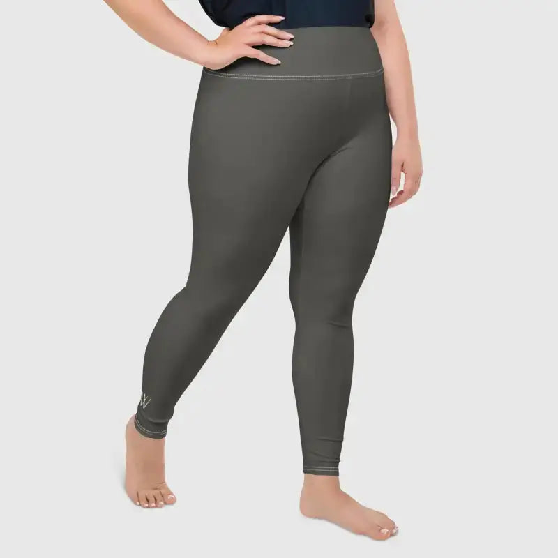 Gray plus-size Pilates leggings featuring four-way stretch for ultimate comfort