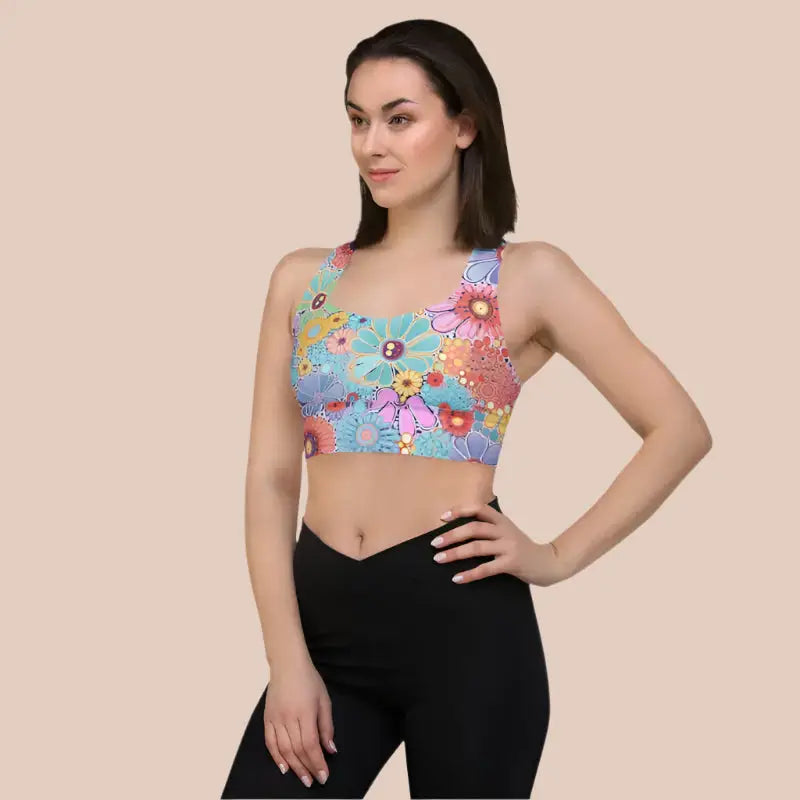 Recycled longline sports bra in a flower design with mild compression support.