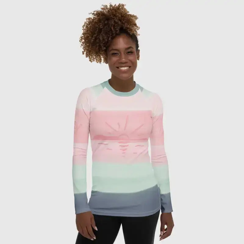 Women's Rash Guard Striped - Revive Wear Women's Striped Rash Guard. This rainbow-striped rash guard keeps the sun off your skin during long days of paddling, swimming or beachcombing. Shop your size today.