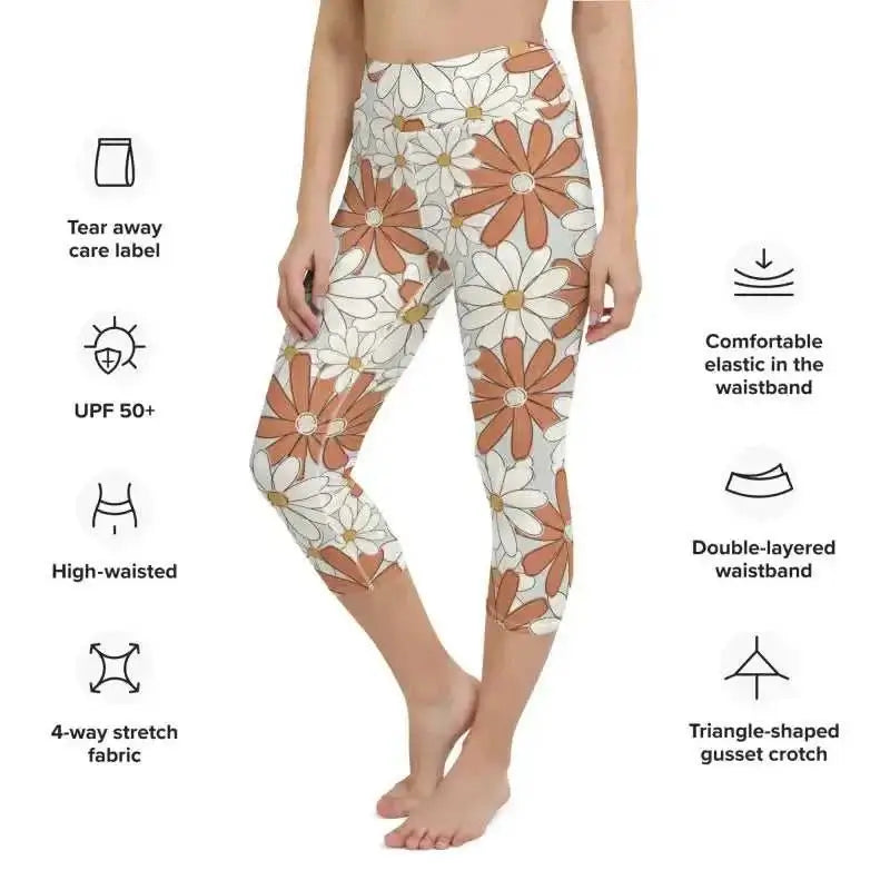 High-waisted capri leggings with orange and white floral print.