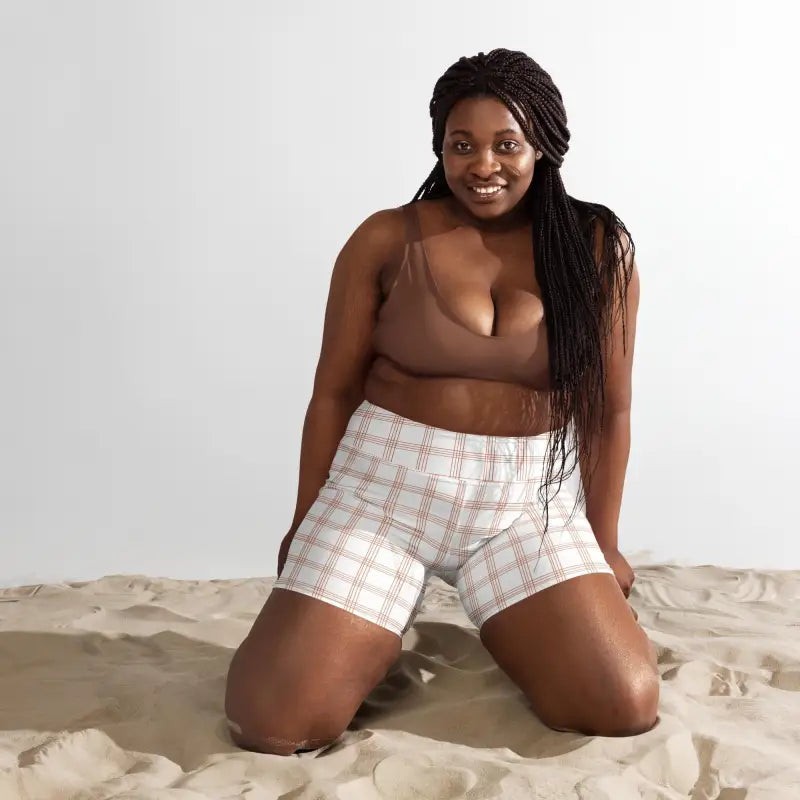 Model wearing high waist pinstripe yoga shorts.