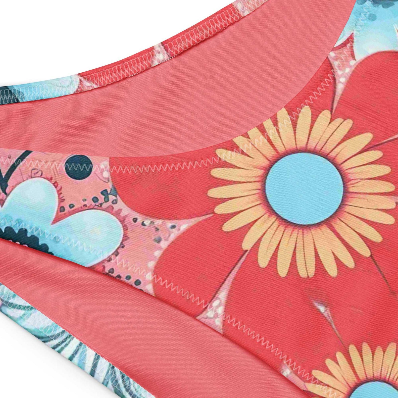 Close-up of bandeau bikini fabric made with floral patterns on a white background
