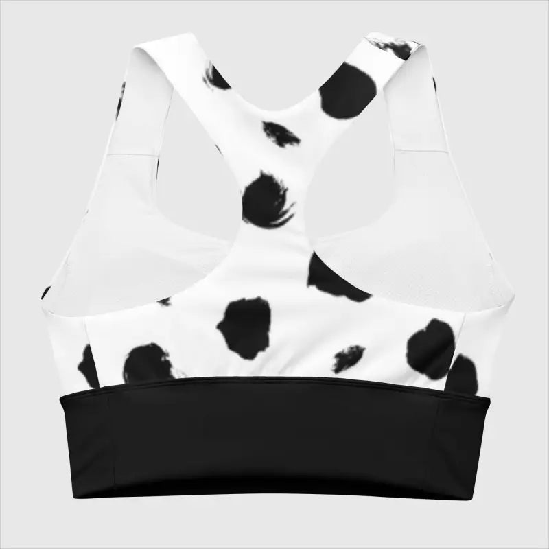 White crown hat with black cow spots, perfect for your sporty look with a longline sports bra