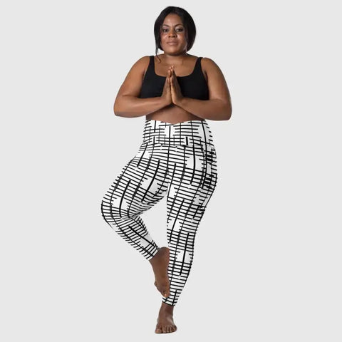 Black Recycled Crossover Leggings with Pockets - Revive Wear     Plus Size Black Recycled Leggings with Pockets. Comfortable plus size leggings with pockets made from recycled materials. Stylish women's activewear.