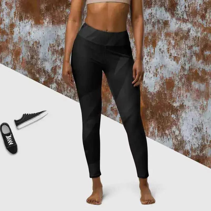 Black yoga leggings with a high waistband perfect for yoga and workout sessions