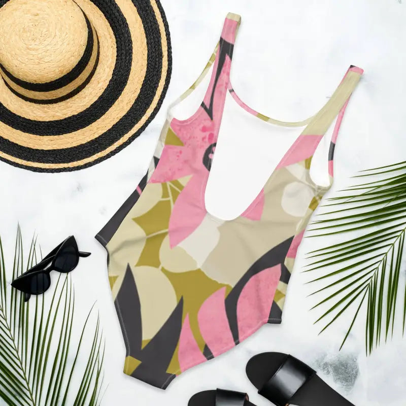 Floral One-Piece Swimsuit | Cheeky One Piece Swimwear - Revive Wear     Cheeky One Piece Swimwear. Floral design with a low back and cheeky cut. Shop Sportswear Accessories for swimsuits, hats, and sports headbands.