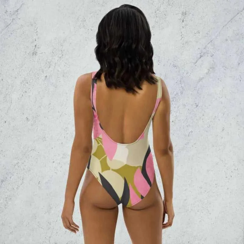 Vibrant Floral One-Piece Swimsuit with a stylish low back design and trendy floral design