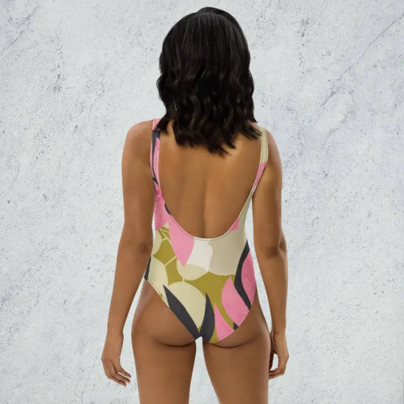 Floral One-Piece Swimsuit | Cheeky One Piece Swimwear - Revive Wear     Cheeky One Piece Swimwear. Floral design with a low back and cheeky cut. Shop Sportswear Accessories for swimsuits, hats, and sports headbands.