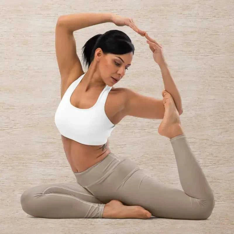 Woman in yoga pose wearing comfy khaki Pilates leggings for effortless style