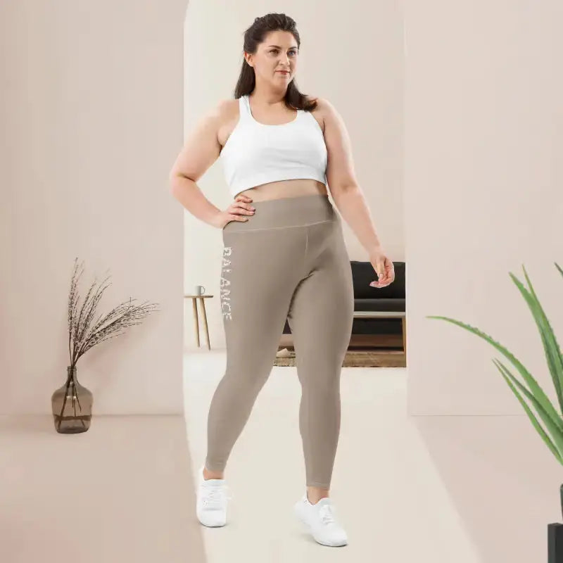 Woman in Khaki Plus Size Leggings with high waistband and stretch fabric for Pilates workouts