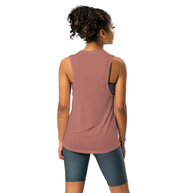 Sleeveless mauve workout tank top with a relaxed fit.