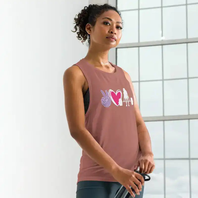 Mauve sleeveless workout tank top with a heart design graphic.