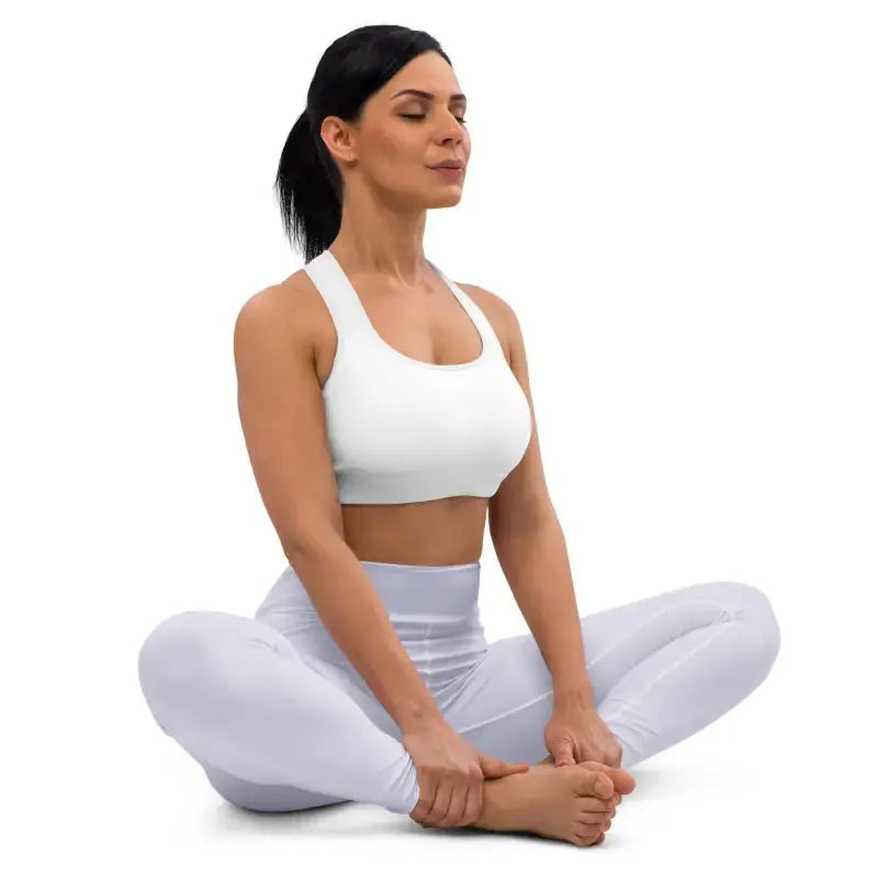 A woman in a yoga outfit meditating wearing Handmade Pilates High Waist Leggings