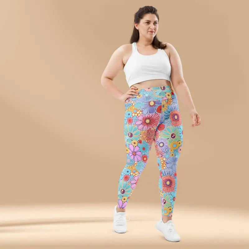 Model wearing 3XL high waist plus size leggings in a floral print