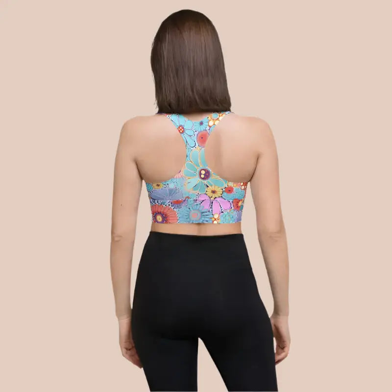 Recycled longline sports bra in a racerback feature design.