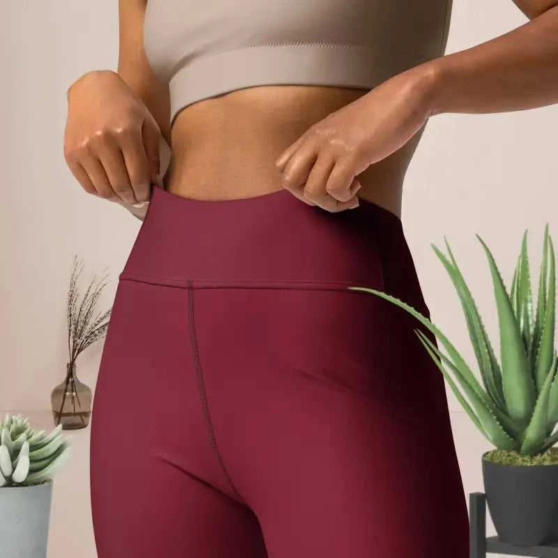 Maroon high-waisted leggings with red floral design from Red Floral Blossom Yoga collection