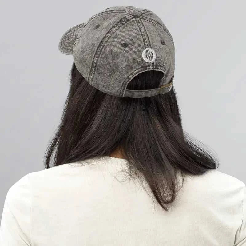 Distressed gray vintage baseball cap from Running Hats collection for workouts