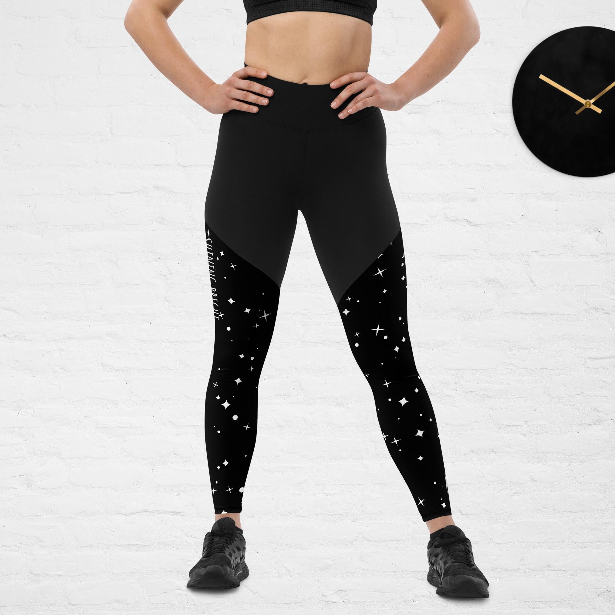 Black sports leggings with stars on lower legs