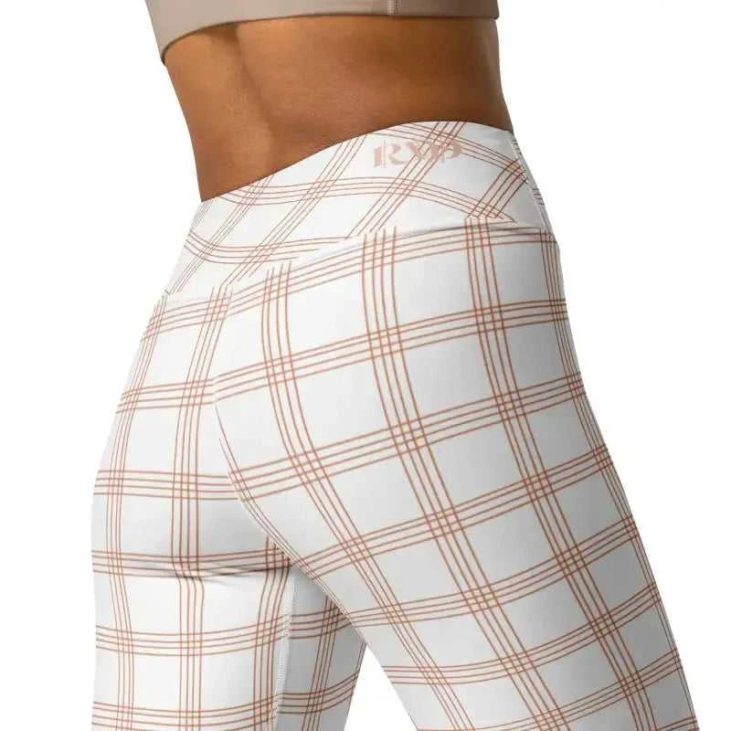 White plaid striped yoga leggings made with four-way stretch fabric for ultimate flexibility