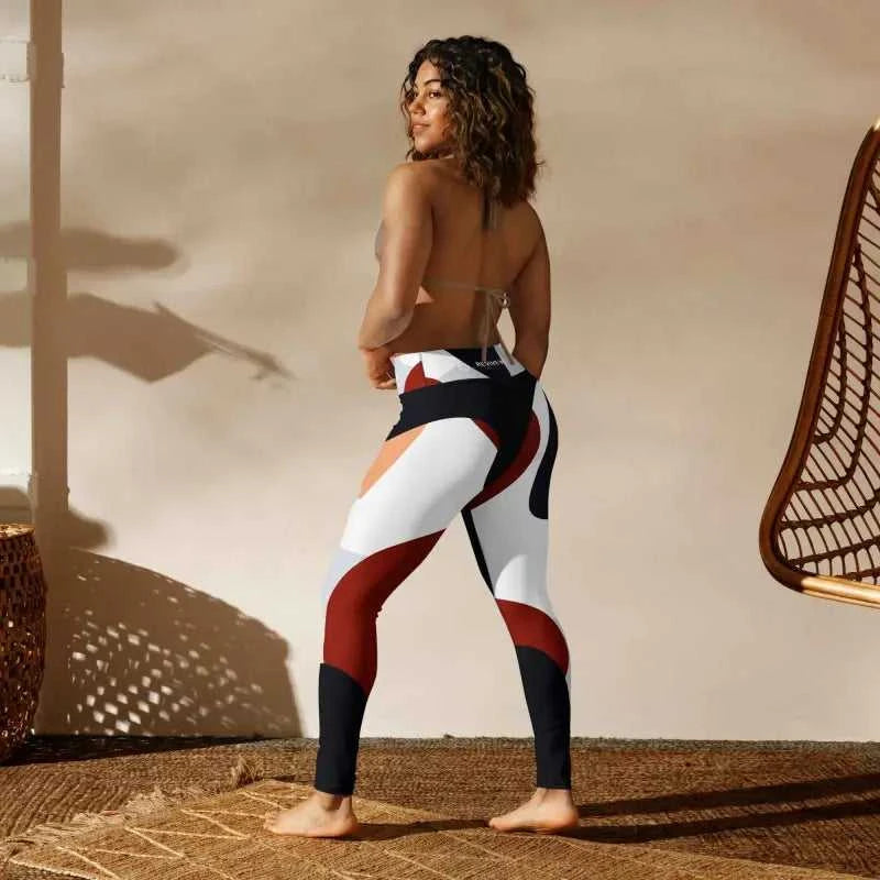 Color-blocked workout leggings in white, red, and black for stylish performance