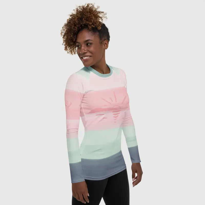 Women's Rash Guard Striped - Revive Wear     Women's Striped Rash Guard. This rainbow-striped rash guard keeps the sun off your skin during long days of paddling, swimming or beachcombing. Shop your size today.