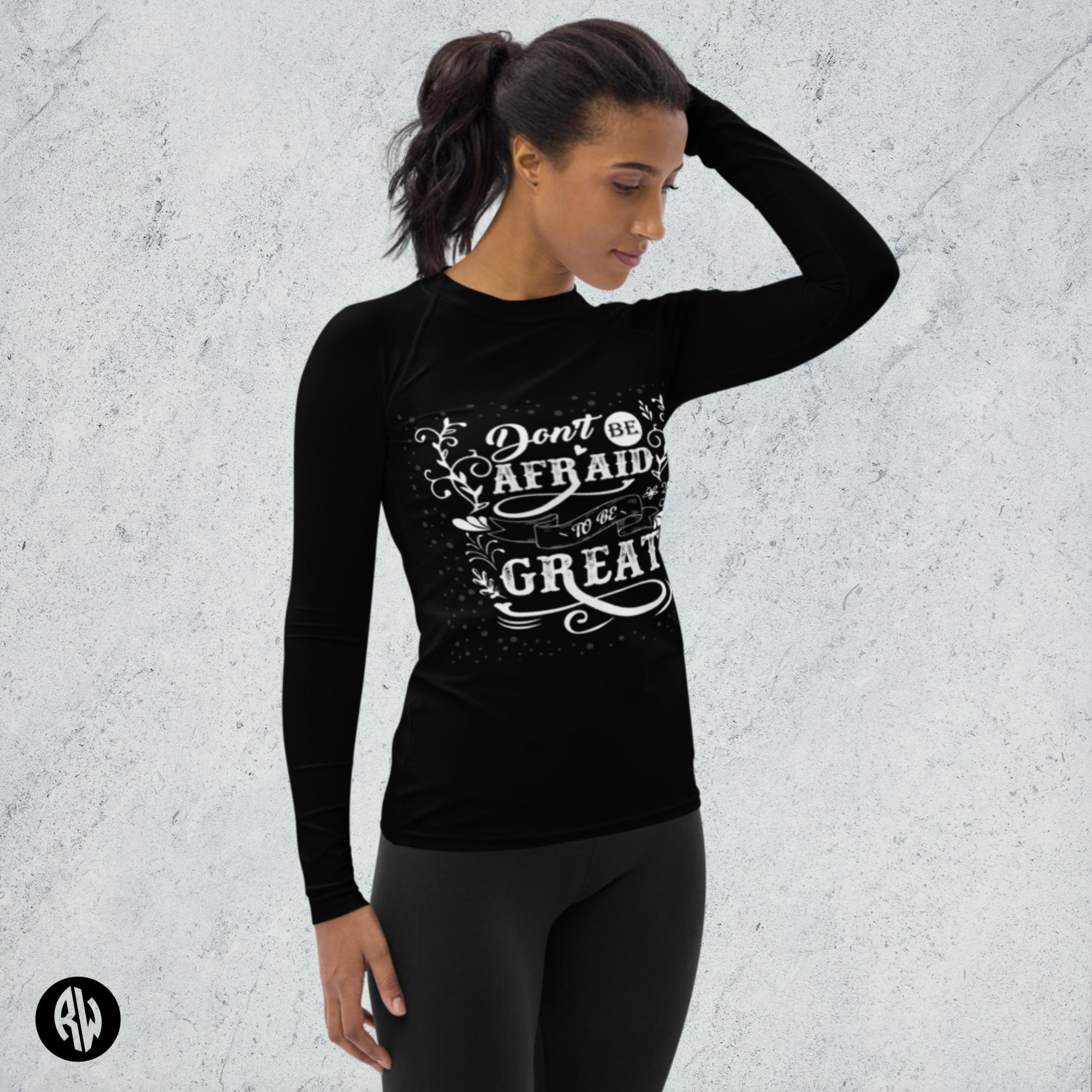 Women's Rash Long Sleeve Top in black with white print. Can be worn for swimming, covering up on a hot summer day, and perfect for keeping warm on cooler days.