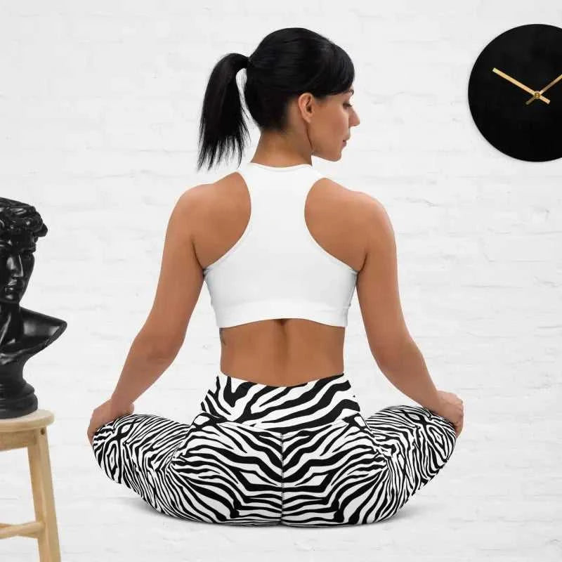 Woman wearing stylish zebra leggings, perfect for workouts and high waist comfort