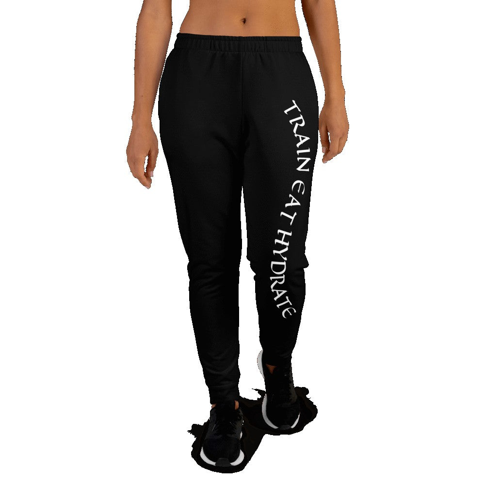 Women's Train Eat Hydrate Joggers in Black - Revive Wear     How to work out in style and comfort. Browse our Women's Joggers at Revive Wear with free shipping on orders of $75 or more.